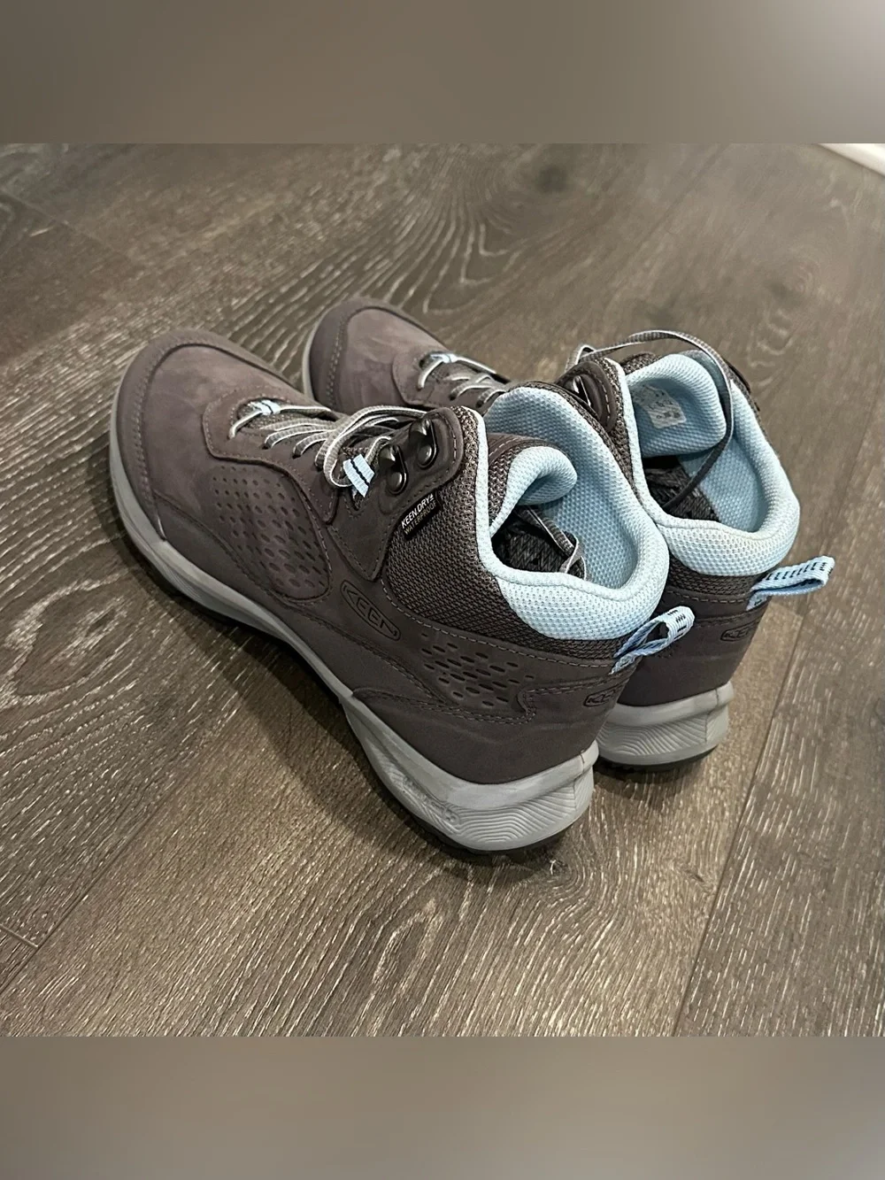 KEEN Gray Lace-Up Women's Hiking Boots with Light Blue Lining.